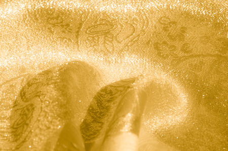 Texture, background, pattern. Fabric - silk light. Gold is yellow. Light Gold 100% Pure Silk Fabric Dupioni Decorative Raw Indianの写真素材