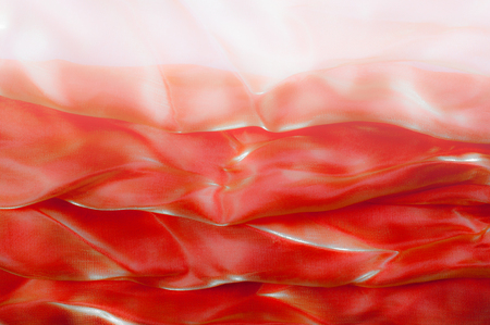 fabric, background texture. Silk is red burgundy. Made for mood only, pure silk taffeta of the highest quality. Light, with a clear and rustling trademark taffeta and with a soft luster. の写真素材