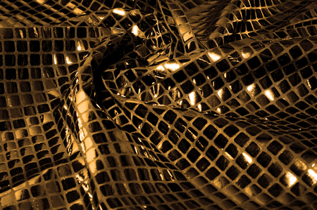 texture, background, pattern. Fabric with large paillettes made of yellow gold. Prepare for a rainbow of color and texture when you take home these multicolored iridescent large glitter.の写真素材