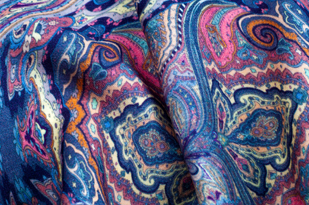 Background texture, pattern. paisley fabric of blue color with a floral pattern. Presenting a vibrant 70's power print that will revitalize your interior space. Soft with subtle textureの写真素材