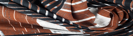 Cotton fabric texture. Brown black white stripe pattern fabric