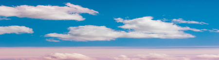 sky clouds texture, background. Dramatic cotton candy sky cloud texture backgroundの写真素材