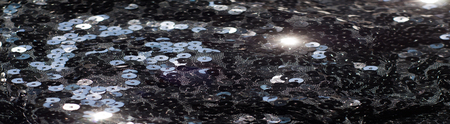 Fabric texture, background, black sequined.tinsel, trumpery, frippery, gaud, gewgaw, gimcrack