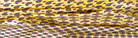 satin fabric texture. beige color. with ornament