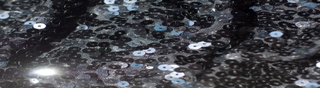 Fabric texture, background, black sequined.tinsel, trumpery, frippery, gaud, gewgaw, gimcrack