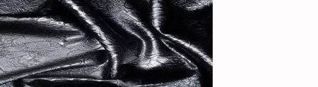 Fabric texture silk black. With gray spots. abstraction