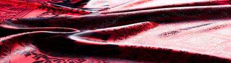 The texture of cotton fabric, with red painted elephants, made in India