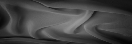 silk fabric is transparent, black and white. this material contains a coarser texture, a more rigid...