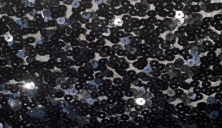 Fabric texture, background, black sequined.tinsel, trumpery, frippery, gaud, gewgaw, gimcrack