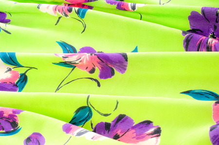 Texture, background, pattern. Silk fabric - green with flowers. Chinese vintage red peony flower...