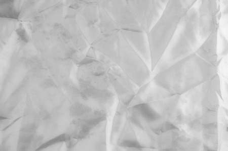 Soft focus texture white silk fabric. Look absolutely perfectly in this Silk and Cotton Dual Satin. This collection of atlases is incredibly smooth to the touch. I approve of your choice. Great designの写真素材