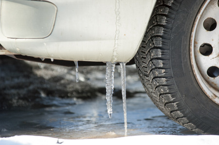 Winter landscape. snow covered car. Sunny day, heavy frost.の写真素材