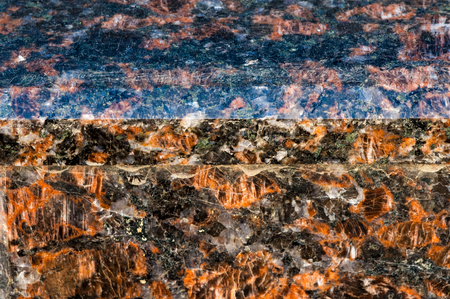 Stone finishing polished granite. Solid rock of a granular structure of quartz, feldspar and mica.の写真素材