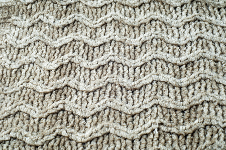 texture, background. pattern. Sweater winter clothes. a knitted garment, usually with long sleeves,...