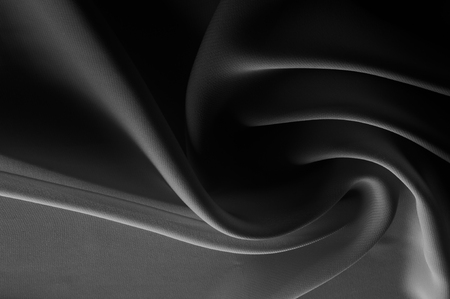 silk fabric is transparent, black and white. this material contains a coarser texture, a more rigid drapery and a slight peeping effect. We recommend using this fabric for your convenience.の写真素材