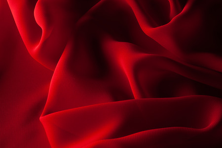 silk fabric red. Silk organza mood is an exceptional fabric that looks beautiful in itself or as a supporting player when used as an underscore or to provide greater support and design structureの写真素材