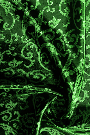 pattern of silk fabric Royal monogram. green. Luminous velvet represents a shining gold floral damask pattern that grows everywhere. This velvet can also be used for a number of fashion applications!の写真素材