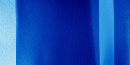 Picture. Texture, background. Blue sapphire silk fabric. This luxurious soft fabric has an...