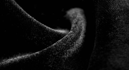 Texture background, pattern. Black Velveteen. This magnificent elastic velor fabric has a velvety nap. Pan pan adds shine and texture! It has a knitted back and is great for your design. Texture background, pattern. Black Velveteen. This magnificent elastic velor fabric has a velvety nap. Pan pan adds shine and texture! It has a knitted back and is great for your design.