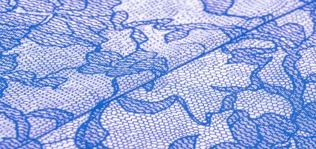 texture, background, pattern. Silk white fabric with lace patterns. This elastic lace trim can add a delicate touch to everything! Decorate your jewelry with your projects, crafts and Internet decorの写真素材