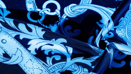 texture, background, black silk fabric with a monogram pattern Exquisite pattern of filigree fabric...