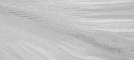 Texture, background, pattern, white silk corrugated crushed fabric for your projectsの写真素材