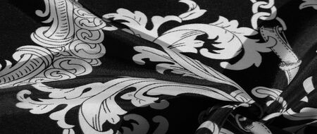 texture, background, black silk fabric with a monogram pattern Exquisite pattern of filigree fabric your design will delight you for a long timeの写真素材