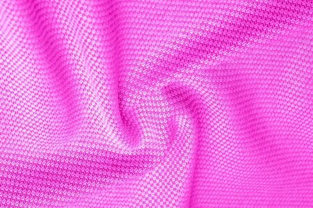 Background texture, pattern Fabric warm wool with a stitched red thread. This one makes us want to curl a fireplace with a mug of hot chocolate. His ultra-soft and fuzzy hand is an open knit designの写真素材