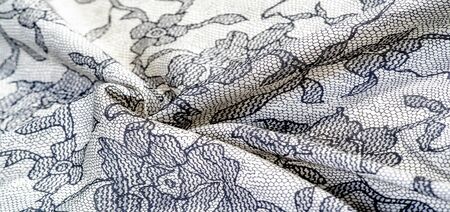 texture, background, pattern. Silk white fabric with lace patterns. This elastic lace trim can add a delicate touch to everything! Decorate your jewelry with your projects, crafts and Internet decorの写真素材