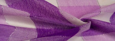Texture background pattern silk scarf female blue in color with a metal stripe. The scarf is...
