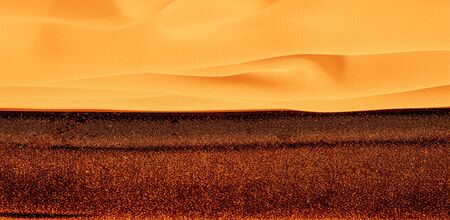 texture background pattern. Yellow silk fabric with a subtle matte sheen. It is perfect for your design, accents, wallpapers, posters and postcards.の写真素材