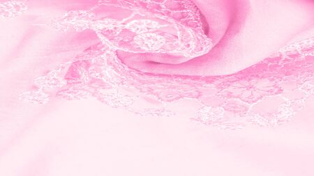 Texture, background, pattern, postcard, silk fabric, female amaranth pink scarf with lace wrappers. Use these fancy images to create your print and digital materials.の写真素材