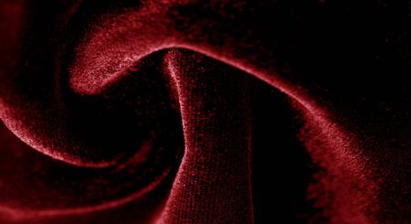 Texture background, pattern. red velveteen. Rock the runway with this beautiful high fashion fabric. This medium weight fabric has a beautiful shine with a velvet face for a feeling of luxury.の写真素材