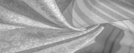 Texture pattern, black gray silk fabric on a white background, flowers pattern silhouette on white background decorative course postcard wallpaper designの写真素材