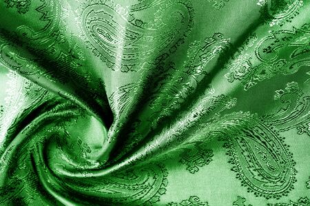 texture, background, green, verdant, lawny, vealy, virid,  blushful fabric with a paisley pattern. based on traditional Asian elementsの写真素材