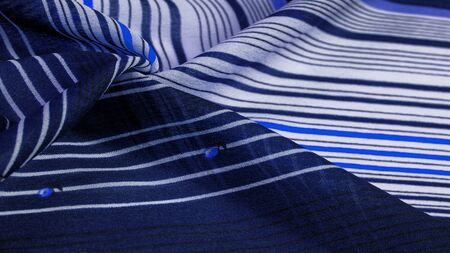 Texture, pattern, collection, silk fabric, blue background with a striped pattern of white and...