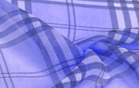 silk, lilac fabric (baby blue), checkered wallpaper in a cage tartan. Scottish tartan dress. Textile pattern from classic fabrics. Fabric textile pattern illustration.の写真素材