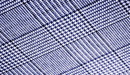 Background texture, pattern. The fabric is thick, warm with a checkered pattern, blue. Stop.の写真素材