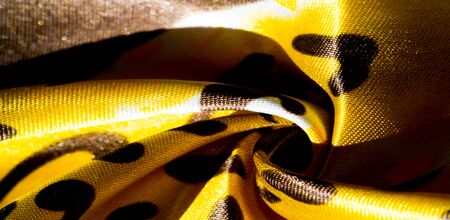 texture, pattern, background. leopard silk fabric. Screen printing on silk duckの写真素材