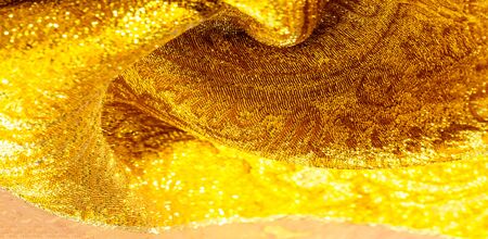 Texture background, pattern. fabric; yellow gold brocade.