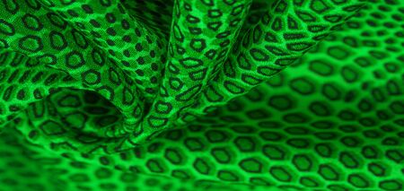 green silk fabric, animal skin.の写真素材