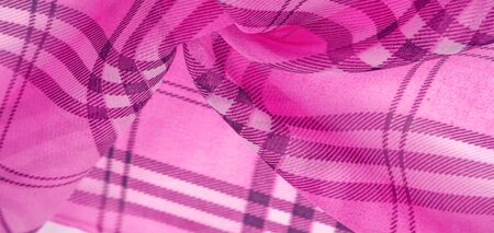 silk, cloth pink (carnation), checkered wallpaper in a cage tartan. Scottish tartan dress. Textile...