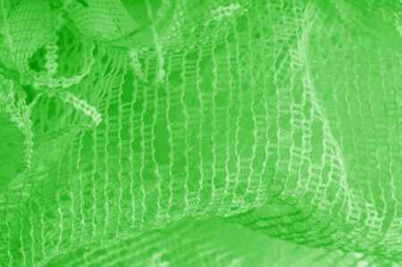 Texture, background, pattern. green tulle. Thin with a heavier weight, insert into your design or...