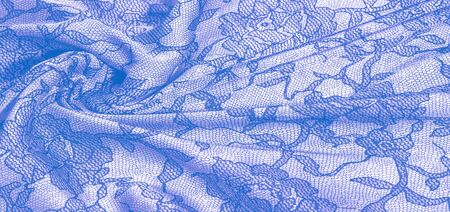 texture, background, pattern. Silk white fabric with lace patterns. This elastic lace trim can add a delicate touch to everything! Decorate your jewelry with your projects, crafts and Internet decorの写真素材
