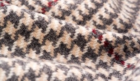 Background texture, pattern. The fabric is thick, warm in a cage, beige. This is 100% wool terry...