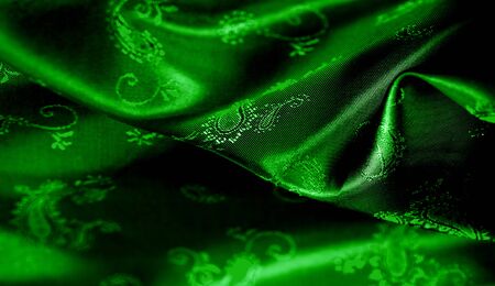 Texture, background, pattern Green silk chiffon fabric with a paisley print. This is a nice addition to any veneer. This is a beautiful floral design for your creativity.の写真素材