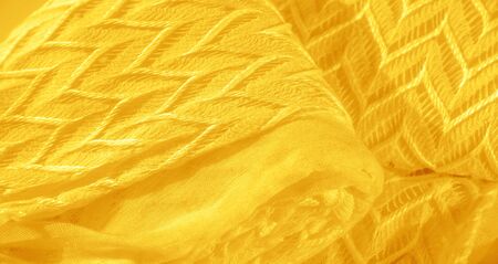 Texture, background, pattern, silk fabric, yellow, layered lace tulle, premium plain winter diamond knitted scarf in the form of infinity loopsの写真素材