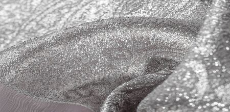 Texture background, pattern. white brocade fabric. Organza brocade fabric - shepherd, with a crunchy...