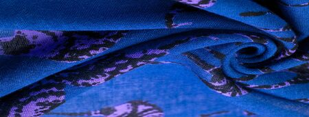 texture, background, cotton fabric of blue color with a print of deer silhouettes, expensive thin fabric will become the leader of your projects, modern Futuristic Fine Artの写真素材