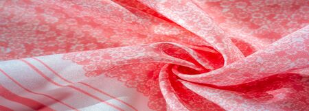Texture, background, pattern, pink silk fabric on a white background, small flowers pattern...